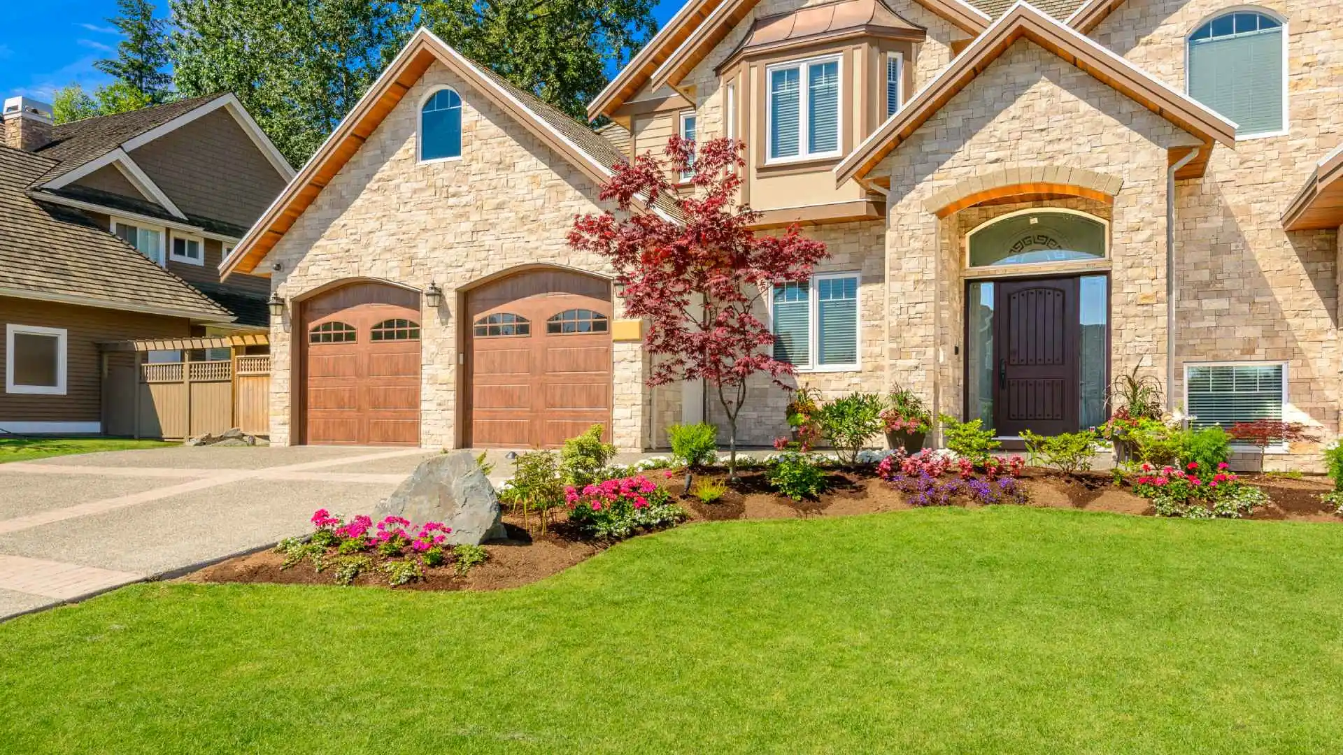 Landscaping and lawn maintained by Turf Badger in Holland, WI.