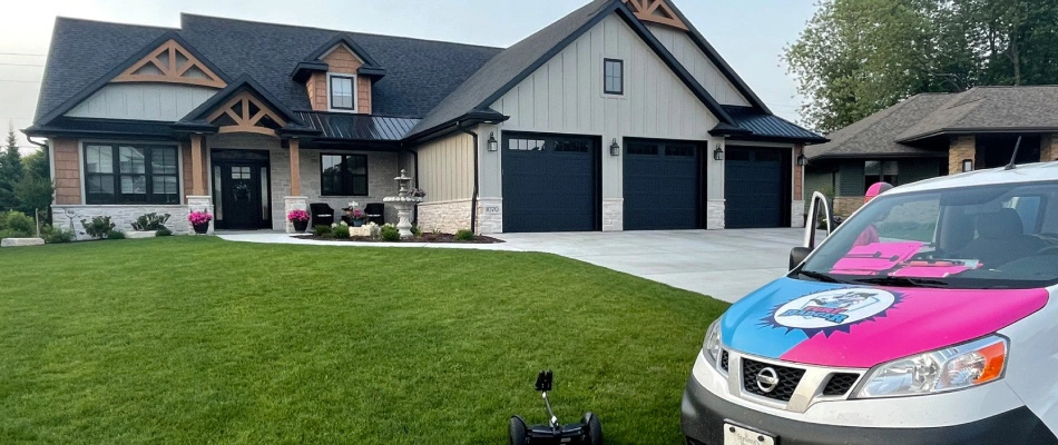 Turf Badger truck displayed by maintained lawn in Black Creek, WI.