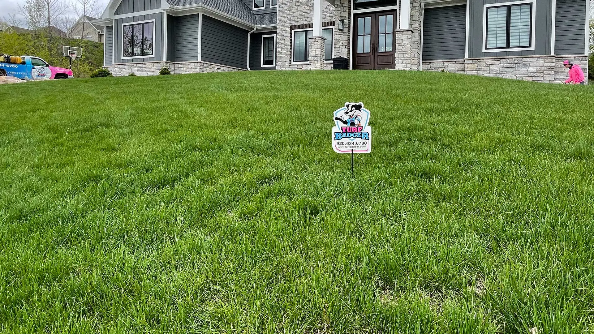 A healthy lawn with annual aeration services in Appleton, WI.