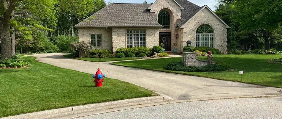Appleton, Wisconsin home with a healthy, green lawn.